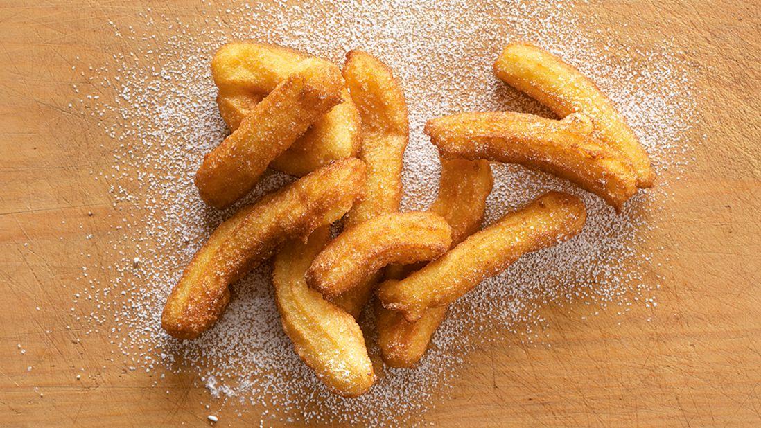 Few places make deep-fried dough pastry as finger-licking good as Spain. Often doused in sugar and dipped in hot melted chocolate, churros are a favorite during street festivals. (Image credit: 